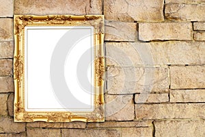 Blank golden frame on brick stone wall