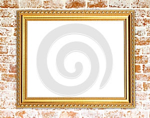 Blank golden frame on brick stone wall