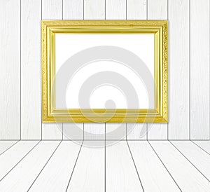 Blank golden frame in room with white wood wall and wood floor