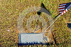 Blank gravestone with American Flag