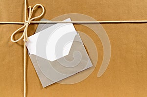 Blank greeting card, address label, paper package background, copy space