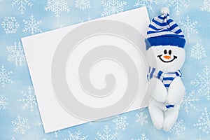 Blank greeting card with a happy snowman