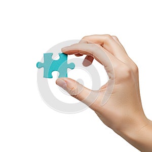 Blank hand holding jigsaw puzzle piece mockup, isolated on white background. Problem-solving and logic design for photo