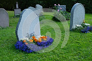 A blank headstone in the private cemetry