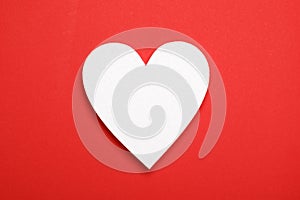 blank heart shape area on red background
