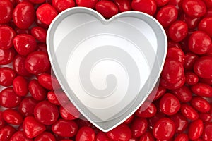 Blank heart surrounded with red candy
