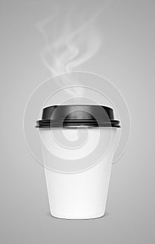 Blank hot coffee cup with steam isolated on gray background