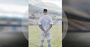 Blank infographic panels and Soccer player standing in stadium on pitch