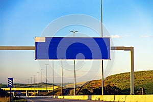 Blank information board on an empty national motorway