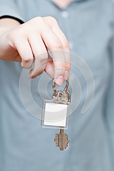 Blank key fob in hand close up