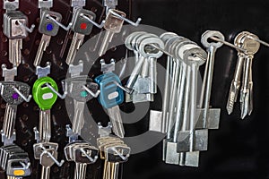 Blank keys on a special wall in a workshop