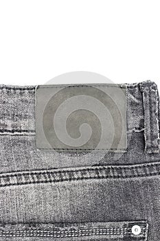 Blank leather jeans label closeup