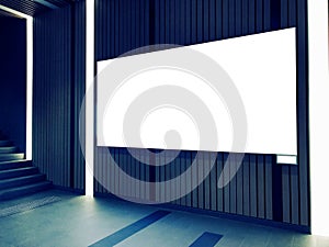 Blank lightbox banner on the wall inside a commercial building