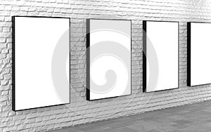 Blank lightboxes on white brick wall