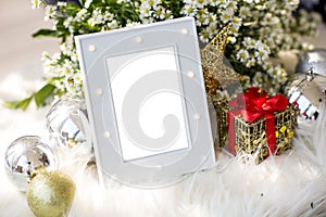 Blank luxury grey photo frame with home decor christmas theme for add text.