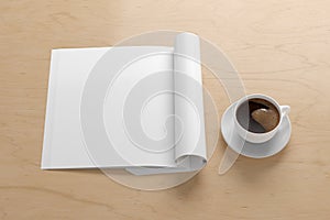 Blank magazine page. Workspace with folded magazine mock up on the desk