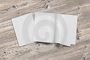 Blank magazine pages with bent glossy pape