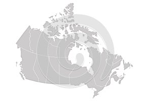 Blank map of Canada divided into 10 provinces and 3 territories. Administrative regions of Canada. Solid grey vector map photo