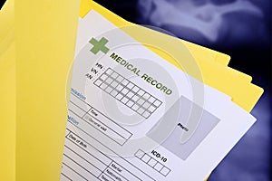 Blank medical record in yellow folder.