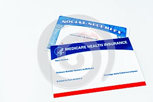 Blank Medicare health insurance and social security card isolated on white