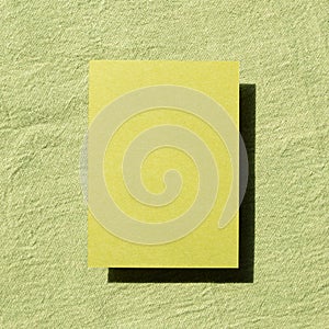 Blank memo pad, empty paper on fabric background