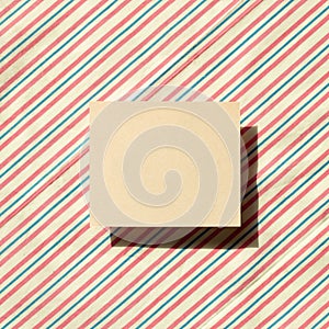 Blank memo pad, empty paper on fabric background