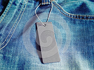 Blank mock-up label tag on clothes.