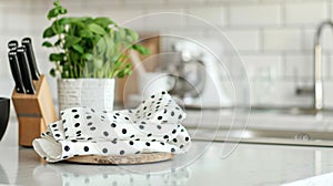Blank mockup of chic black and white polka dot kitchen towels with a pop of color.