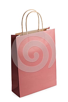 Blank mockup of shopping bag from recycle paper isolated on white background. Packet for gift or present.