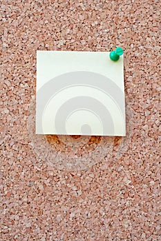 Blank note on a corkboard
