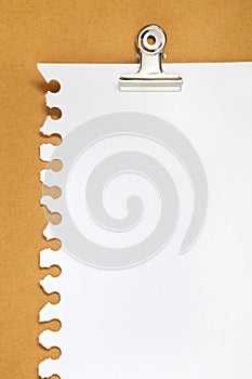 Blank note paper on cardboard background