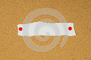 Blank note paper on cork board