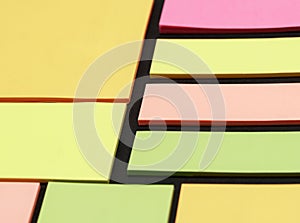 Blank note paper set of different colours forms and sizes. Sticky notes collection on black background