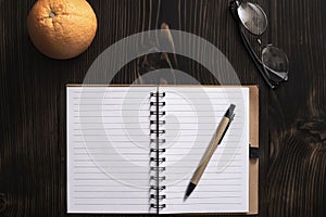 Blank Notebook on a Desk