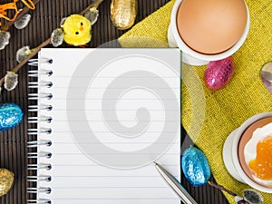 Blank notebook and Easter decorations