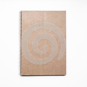 Blank notebook with kraft cardboard cover and spiral, mockup