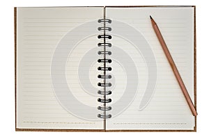 Blank notebook and pencil on white background