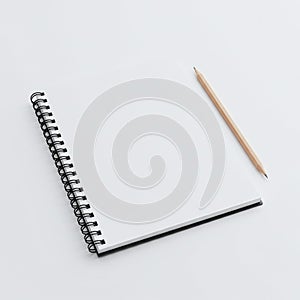 Blank Notebook and Pencil on White Background