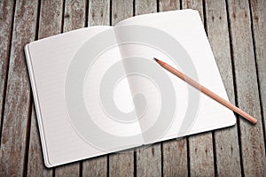 Blank notebook and pencil