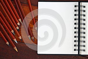 Blank Notebook and Pencils