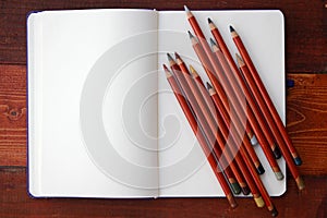 Blank Notebook and Pencils