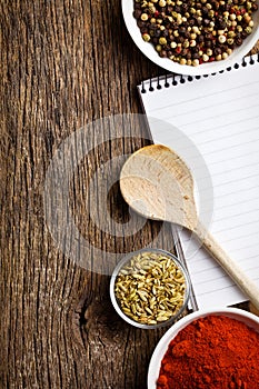 Blank notebook and spices