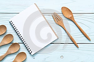blank notebook for text note on wooden surface with copy sapce