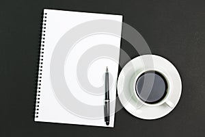 Blank notepad with coffee