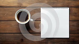 Blank notepad flat lay design with coffee cup on wooden table