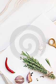 Blank notepad pages with greens herbs and spices