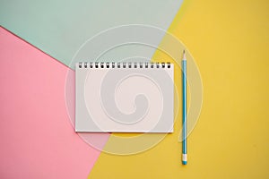 Blank notepad and a pencil