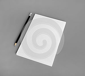 Blank notepad, pencil