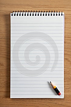 Blank notepad and pencil