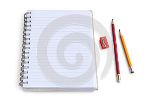 Blank notepad with pencil and sharpener